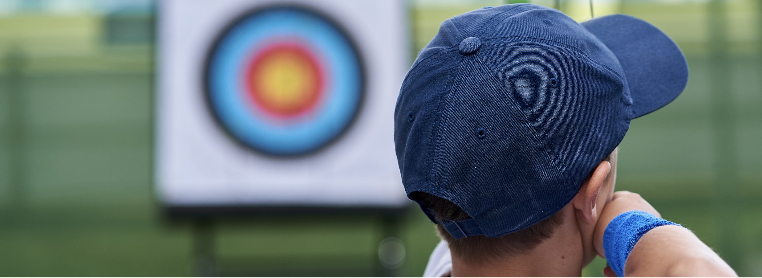 boy practicing archery